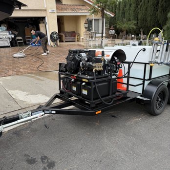Driveway and exterior walls cleaned by Hot Shot